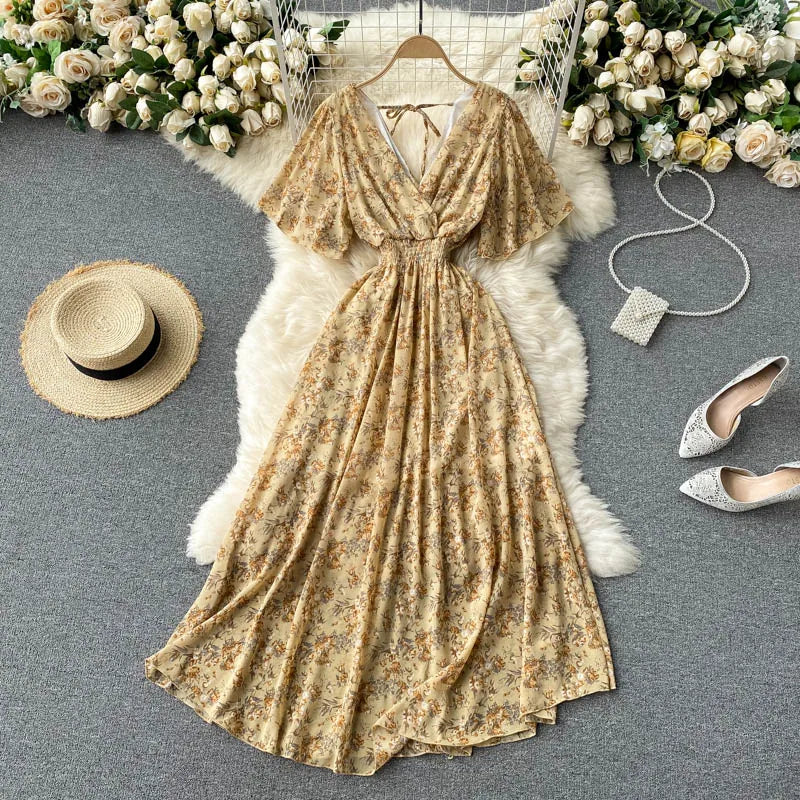 Floral Print Ruffle Chiffon Elegant Midi Dress A-line V Neck Beach VacSPECIFICATIONSBrand Name: unidanceElasticity: Non StrechSleeve Style: regularFabric Type: POLYESTERHign-concerned Chemical: NonePattern Type: PrintFit Type: SlimSilhDMEwomenstorenull