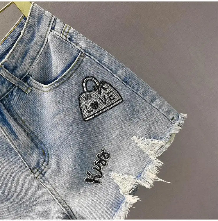 Denim Shorts Retro Slim Ragged Hot Pants Female Short JeansSPECIFICATIONSBrand Name: VWBQNZDecoration: ButtonDecoration: HOLEDecoration: PocketsFabric Type: BroadclothHign-concerned Chemical: NonePant Style: regularPattern TDMEwomenstorenull