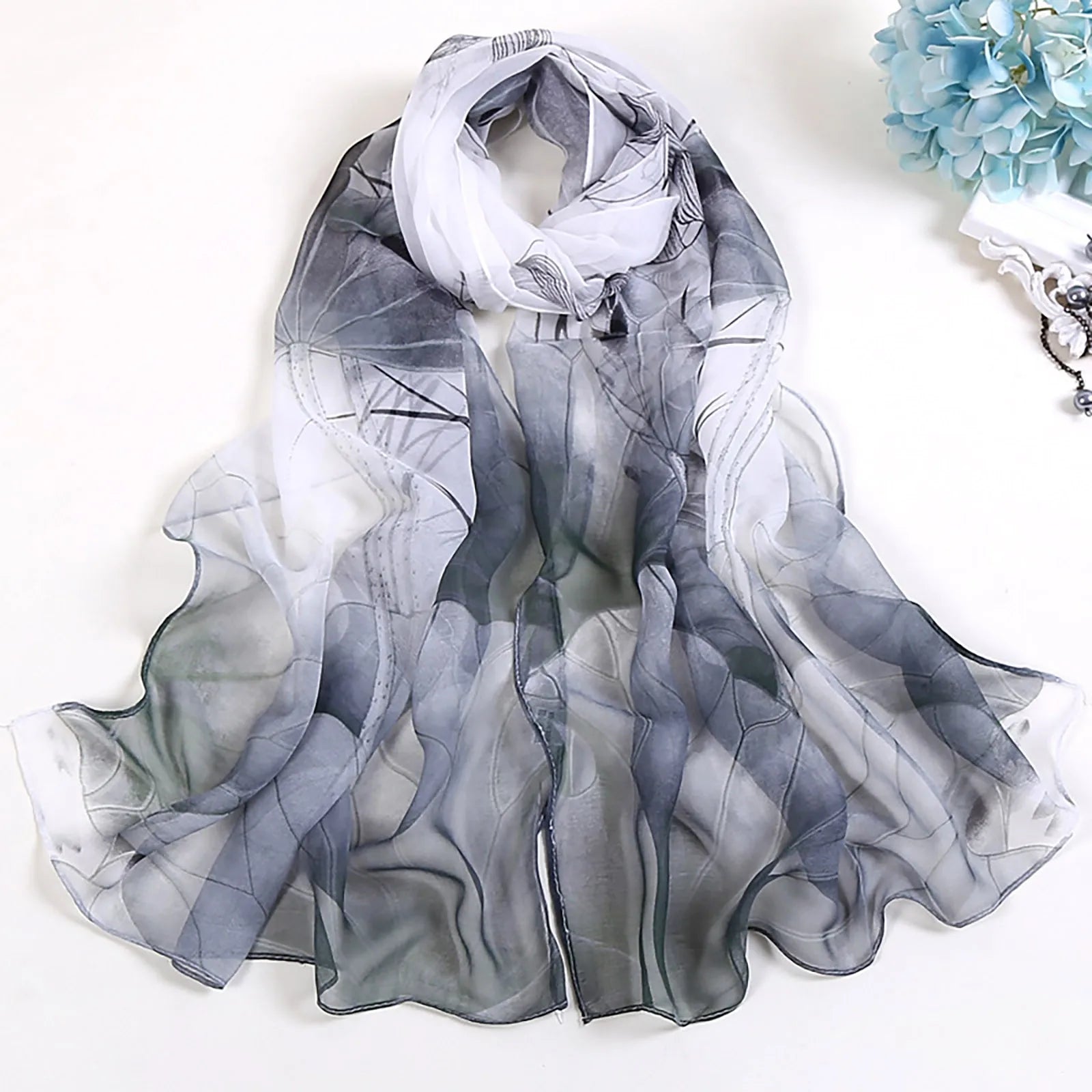 Fashion Long Scarf Women Thin Shawls and Wraps Hijab Floral Print SunsSPECIFICATIONS
Brand Name: ZOMAXIUJEE
Material: POLYESTER
Applicable Season: winter
Department Name: ADULT
Applicable Scene: CASUAL
Gender: WOMEN
Feature: Keep warm
DMEwomenstorenull