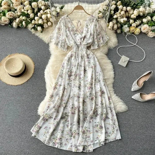 Floral Print Ruffle Chiffon Elegant Midi Dress A-line V Neck Beach VacSPECIFICATIONSBrand Name: unidanceElasticity: Non StrechSleeve Style: regularFabric Type: POLYESTERHign-concerned Chemical: NonePattern Type: PrintFit Type: SlimSilhDMEwomenstorenull