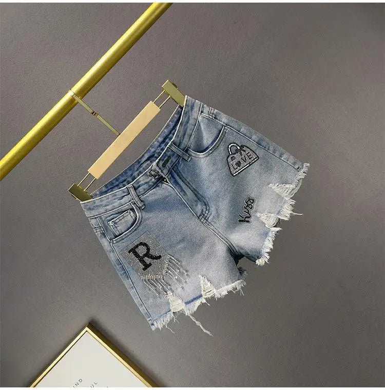 Denim Shorts Retro Slim Ragged Hot Pants Female Short JeansSPECIFICATIONSBrand Name: VWBQNZDecoration: ButtonDecoration: HOLEDecoration: PocketsFabric Type: BroadclothHign-concerned Chemical: NonePant Style: regularPattern TDMEwomenstorenull