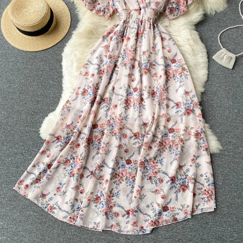 Floral Print Ruffle Chiffon Elegant Midi Dress A-line V Neck Beach VacSPECIFICATIONSBrand Name: unidanceElasticity: Non StrechSleeve Style: regularFabric Type: POLYESTERHign-concerned Chemical: NonePattern Type: PrintFit Type: SlimSilhDMEwomenstorenull