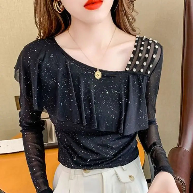 Sweet Skew Collar Spliced Gauze Ruffles Beading Blouse Female ClothingSPECIFICATIONSBrand Name: COZOKStyle: SweetElasticity: Slight StrechOrigin: Mainland ChinaSeason: Spring/SummerFabric Type: blendedMaterial: POLYESTERPattern Type: SDMEwomenstorenull