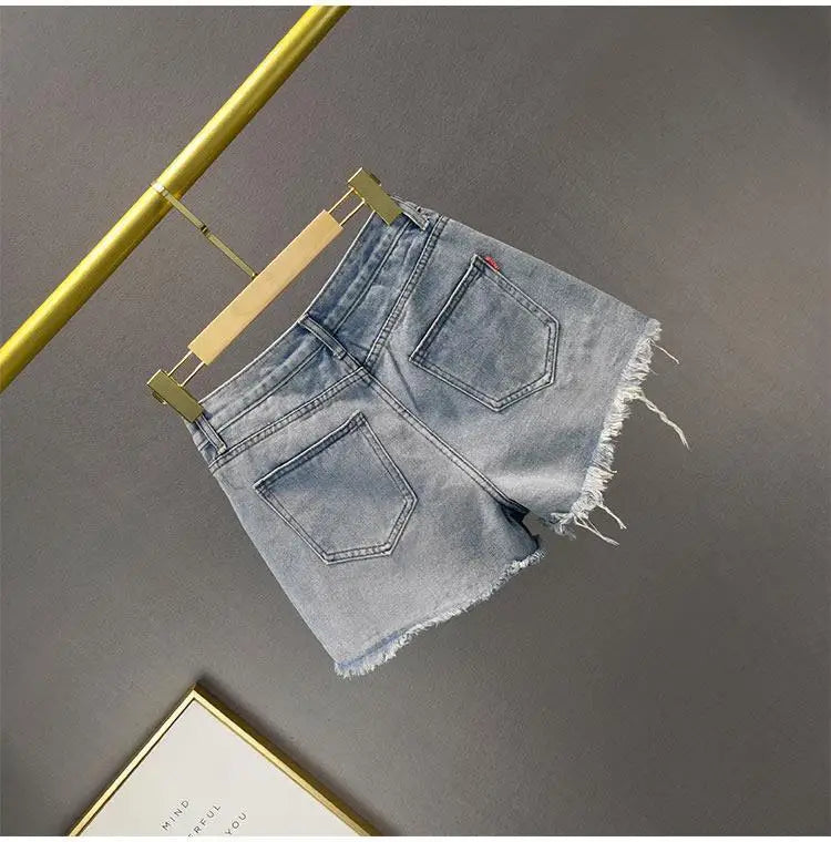 Denim Shorts Retro Slim Ragged Hot Pants Female Short JeansSPECIFICATIONSBrand Name: VWBQNZDecoration: ButtonDecoration: HOLEDecoration: PocketsFabric Type: BroadclothHign-concerned Chemical: NonePant Style: regularPattern TDMEwomenstorenull