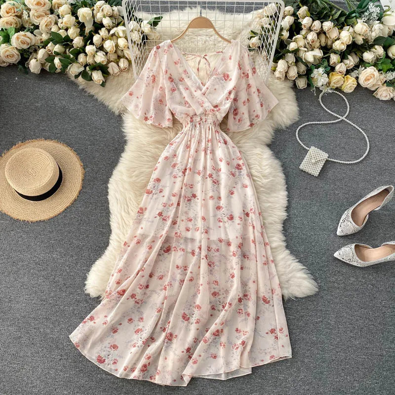 Floral Print Ruffle Chiffon Elegant Midi Dress A-line V Neck Beach VacSPECIFICATIONSBrand Name: unidanceElasticity: Non StrechSleeve Style: regularFabric Type: POLYESTERHign-concerned Chemical: NonePattern Type: PrintFit Type: SlimSilhDMEwomenstorenull