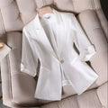 Slim white blazer with three-quarter sleeves and single button, for women.