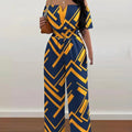 Fashion Printed Wide Leg Jumpsuit Women Sexy Slash Neck Off-shoulder HSPECIFICATIONSBrand Name: FUXIONGFUStyle: CasualAge: JUNIOROrigin: Mainland ChinaCN: GuangdongSeason: SummerMaterial: POLYESTERDecoration: noneFabric Type: POLYESTERDMEwomenstorenull