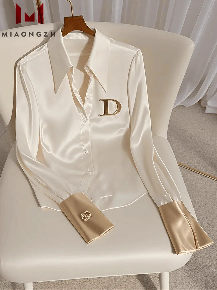 High Quality Fashion Women's White Satin Shirt Turn Down Collar Long SSPECIFICATIONSBrand Name: MIAONGZHFabric Type: SATINHign-concerned Chemical: NonePattern Type: PatchworkFit Type: SlimStyle: Office LadyAge: JUNIORThickness: midweigDMEwomenstorenull