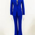 Gradient green slim fitting two-piece suit for women with blazer and flare pants, formal style.