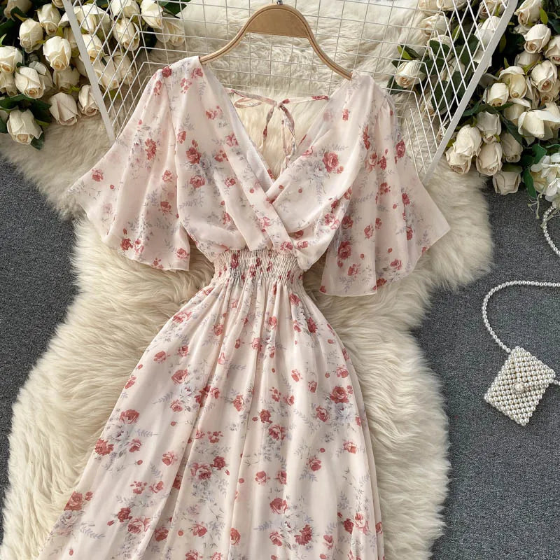 Floral Print Ruffle Chiffon Elegant Midi Dress A-line V Neck Beach VacSPECIFICATIONSBrand Name: unidanceElasticity: Non StrechSleeve Style: regularFabric Type: POLYESTERHign-concerned Chemical: NonePattern Type: PrintFit Type: SlimSilhDMEwomenstorenull