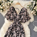 Floral Print Ruffle Chiffon Elegant Midi Dress A-line V Neck Beach VacSPECIFICATIONSBrand Name: unidanceElasticity: Non StrechSleeve Style: regularFabric Type: POLYESTERHign-concerned Chemical: NonePattern Type: PrintFit Type: SlimSilhDMEwomenstorenull