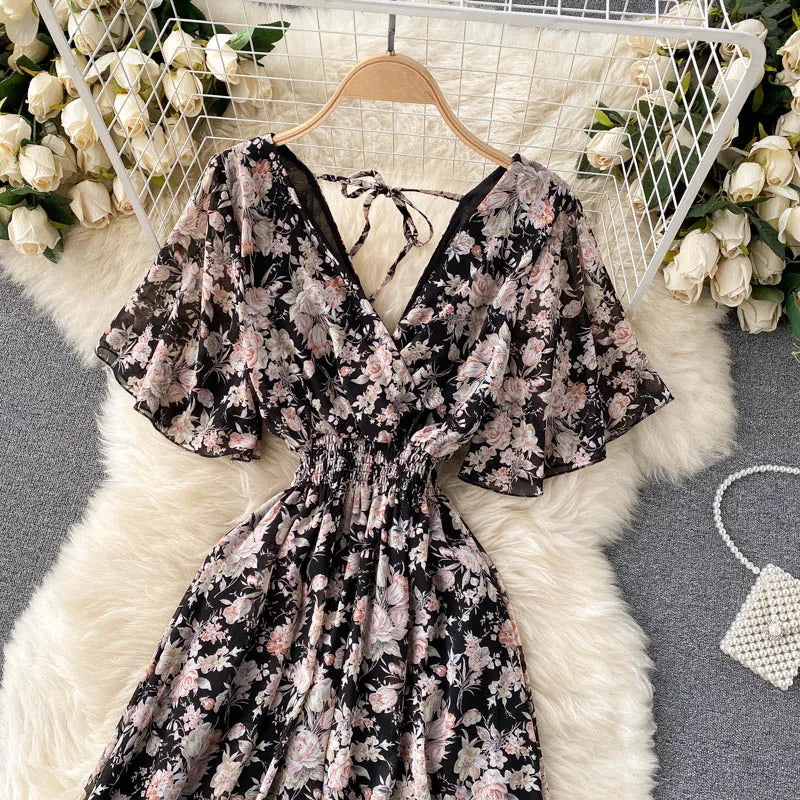 Floral Print Ruffle Chiffon Elegant Midi Dress A-line V Neck Beach VacSPECIFICATIONSBrand Name: unidanceElasticity: Non StrechSleeve Style: regularFabric Type: POLYESTERHign-concerned Chemical: NonePattern Type: PrintFit Type: SlimSilhDMEwomenstorenull