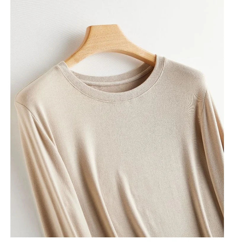 Wool Soft Long Sleeve T-shirts Women Round Neck Slim Fit Basic HeatingSPECIFICATIONSBrand Name: Y DemoStyle: Office LadyAge: MIDDLE AGEOrigin: Mainland ChinaCN: ZhejiangSeason: Autumn/WinterClothing Length: regularDecoration: noneElastDMEwomenstorenull