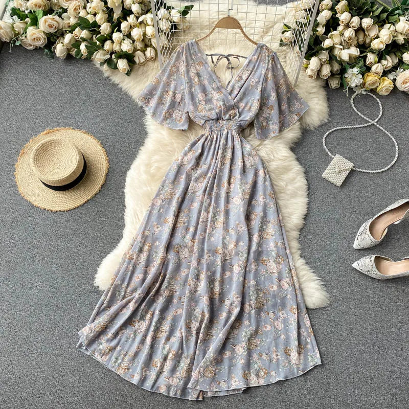 Floral Print Ruffle Chiffon Elegant Midi Dress A-line V Neck Beach VacSPECIFICATIONSBrand Name: unidanceElasticity: Non StrechSleeve Style: regularFabric Type: POLYESTERHign-concerned Chemical: NonePattern Type: PrintFit Type: SlimSilhDMEwomenstorenull