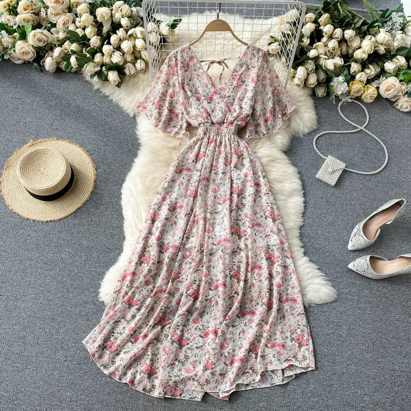 Floral Print Ruffle Chiffon Elegant Midi Dress A-line V Neck Beach VacSPECIFICATIONSBrand Name: unidanceElasticity: Non StrechSleeve Style: regularFabric Type: POLYESTERHign-concerned Chemical: NonePattern Type: PrintFit Type: SlimSilhDMEwomenstorenull