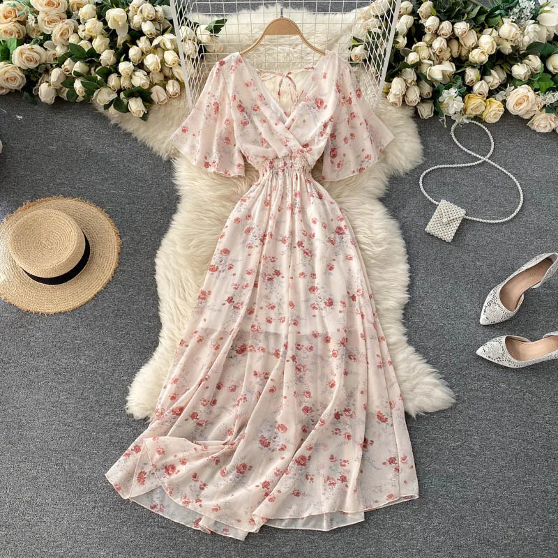 Floral Print Ruffle Chiffon Elegant Midi Dress A-line V Neck Beach VacSPECIFICATIONSBrand Name: unidanceElasticity: Non StrechSleeve Style: regularFabric Type: POLYESTERHign-concerned Chemical: NonePattern Type: PrintFit Type: SlimSilhDMEwomenstorenull