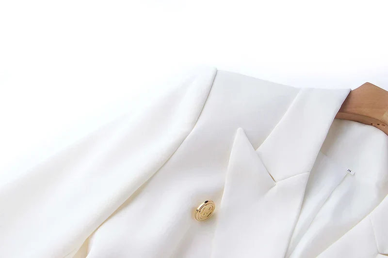 Luxury white women's pocket blazer with notched collar and double-breasted closure.