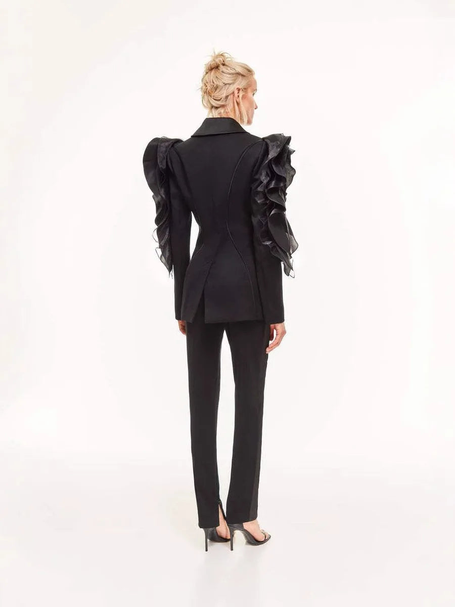 Ladies slim black blazer coat with ruffled detailing, long sleeves, single button closure.