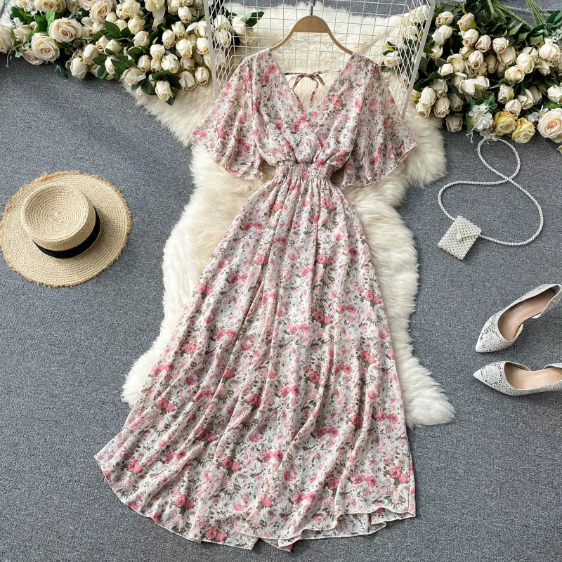 Floral Print Ruffle Chiffon Elegant Midi Dress A-line V Neck Beach VacSPECIFICATIONSBrand Name: unidanceElasticity: Non StrechSleeve Style: regularFabric Type: POLYESTERHign-concerned Chemical: NonePattern Type: PrintFit Type: SlimSilhDMEwomenstorenull