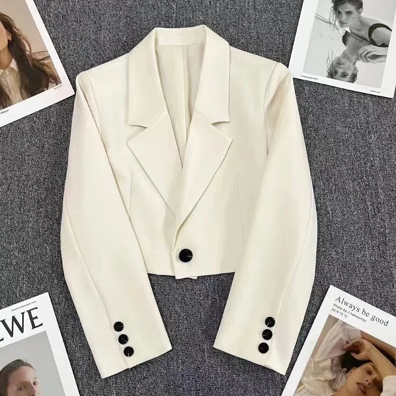 Women's loose solid color short suit jacket with notched collar and single-button closure, ideal for spring and fall office wear.