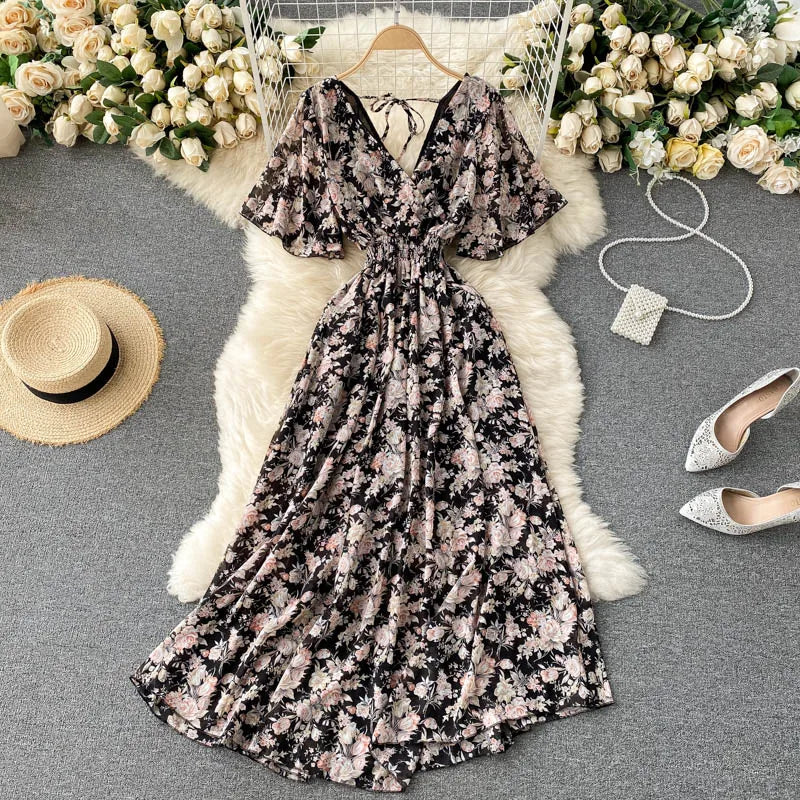 Floral Print Ruffle Chiffon Elegant Midi Dress A-line V Neck Beach VacSPECIFICATIONSBrand Name: unidanceElasticity: Non StrechSleeve Style: regularFabric Type: POLYESTERHign-concerned Chemical: NonePattern Type: PrintFit Type: SlimSilhDMEwomenstorenull