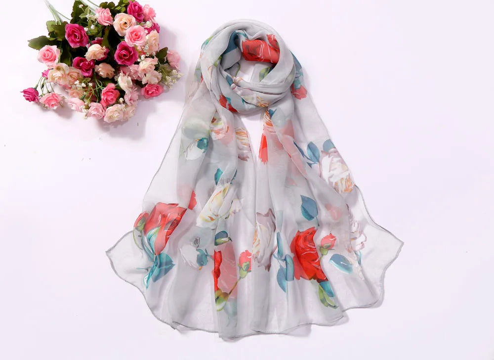 Scarf Women Foulard Shawl Bandana Elegant Beach Sun ProtectionSPECIFICATIONSDepartment Name: ADULTSize: 50*160cm(1cm=0.39in)pattern: RoseApply to season: Spring,Autumn,summerStyle: ElegantColor: Red,Black,Navy blueBrand Name: NDMEwomenstorenull