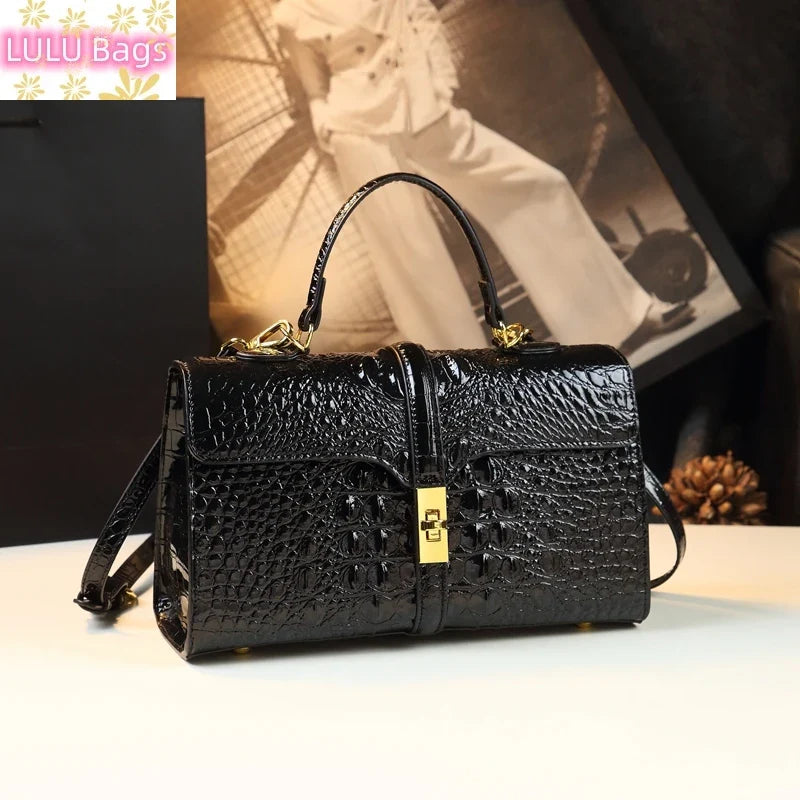 Leather Crocodile Pattern Women's Bag Fashion Brand Ladies HandbagsSPECIFICATIONSBrand Name: NoEnName_NullOrigin: Mainland ChinaCN: GuangdongLining Material: COTTONLining Material: POLYESTERMain Material: Genuine leatherPlace Of OriDMEwomenstorenull