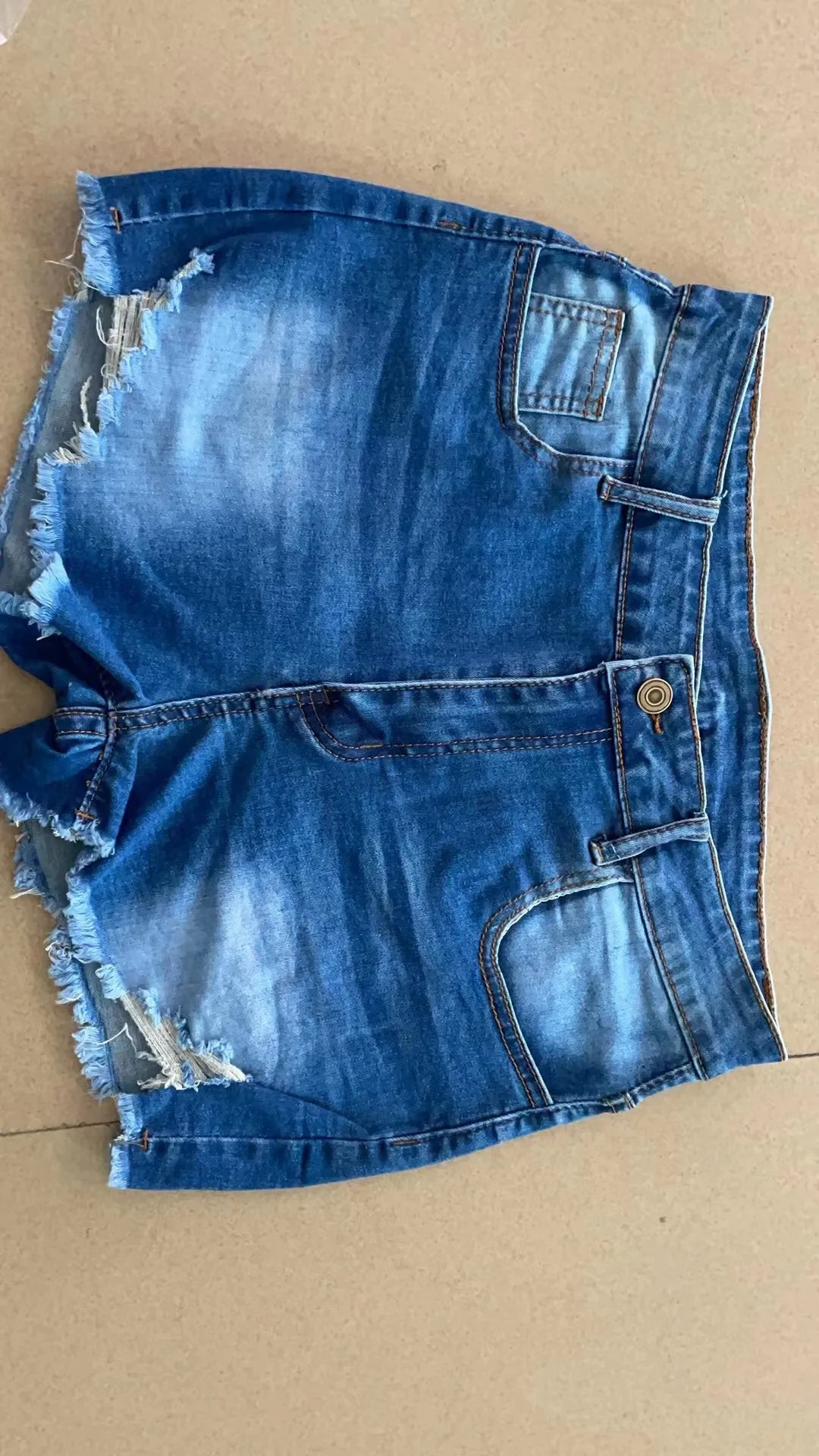 Women Stretch Ripped Denim Shorts Jeans High Waist Booty ShortsSPECIFICATIONSBrand Name: JCLOTHZIDecoration: HOLEFabric Type: DenimHign-concerned Chemical: NonePant Style: regularPattern Type: SolidFit Type: regularStyle: AmericDMEwomenstorenull