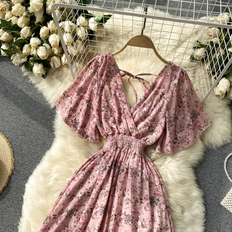 Floral Print Ruffle Chiffon Elegant Midi Dress A-line V Neck Beach VacSPECIFICATIONSBrand Name: unidanceElasticity: Non StrechSleeve Style: regularFabric Type: POLYESTERHign-concerned Chemical: NonePattern Type: PrintFit Type: SlimSilhDMEwomenstorenull