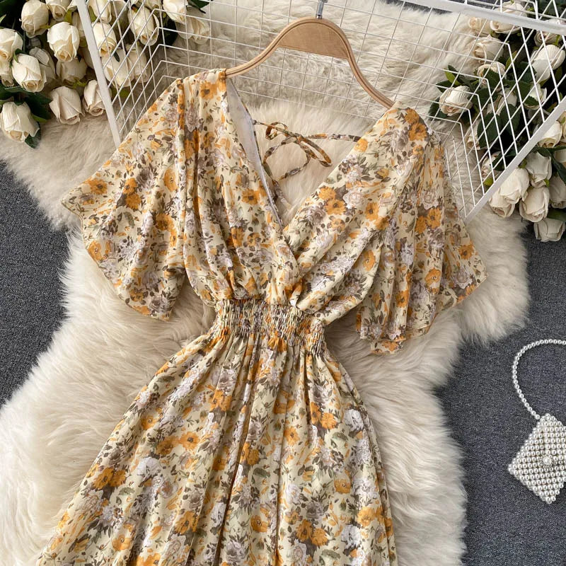 Floral Print Ruffle Chiffon Elegant Midi Dress A-line V Neck Beach VacSPECIFICATIONSBrand Name: unidanceElasticity: Non StrechSleeve Style: regularFabric Type: POLYESTERHign-concerned Chemical: NonePattern Type: PrintFit Type: SlimSilhDMEwomenstorenull