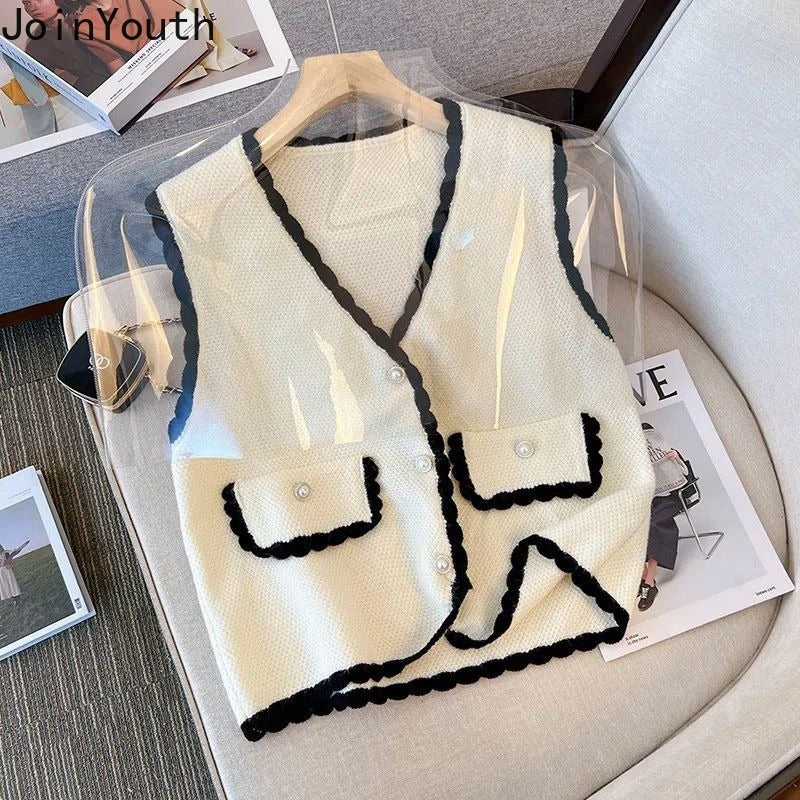 Vest Sweater Women Clothing V-neck Ruffles Single Breasted Vintage WaiSPECIFICATIONSBrand Name: JoinYouthStyle: vintageAge: JUNIOROrigin: Mainland ChinaCN: AnhuiSeason: Autumn/WinterThickness: StandardDecoration: ButtonMaterial: POLYESDMEwomenstorenull