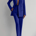 Two piece women's blazer suit with long sleeves and pencil pants, double-breasted, office lady style in solid color.